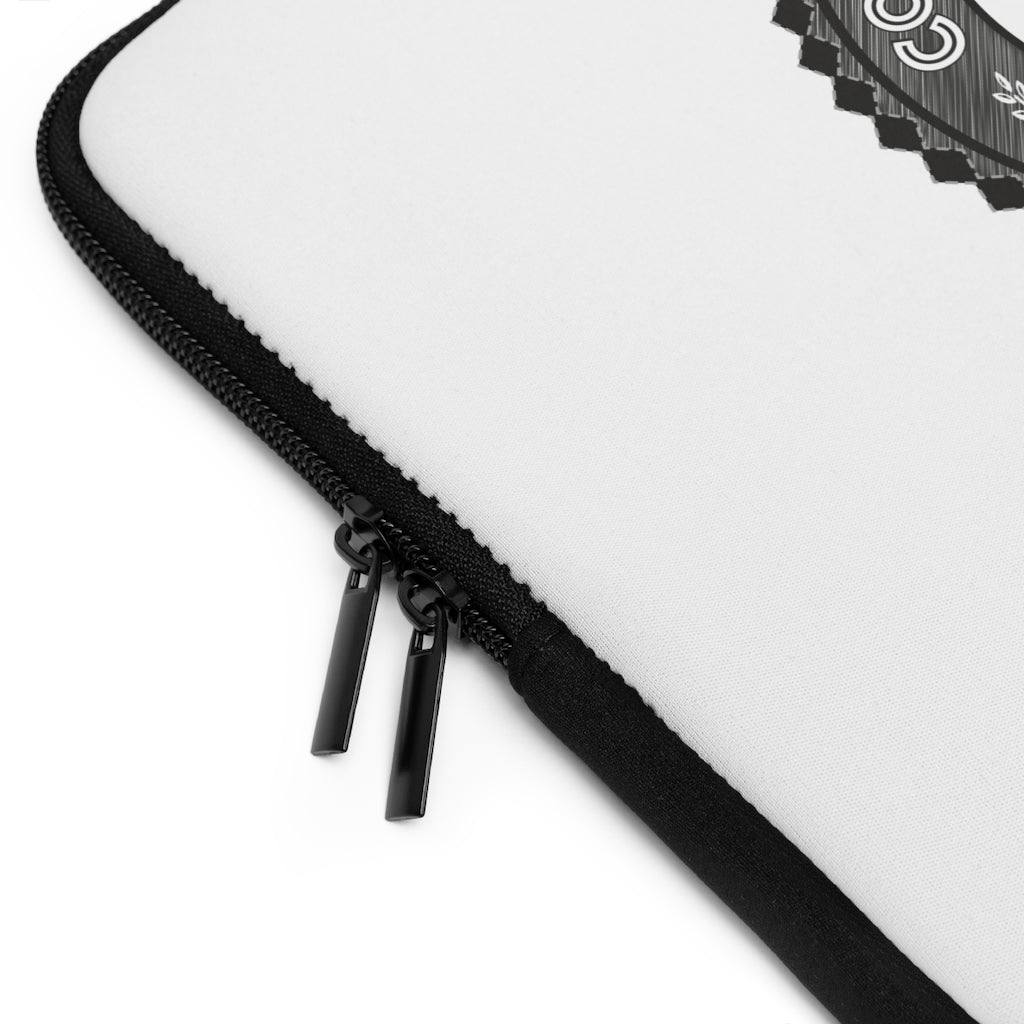 THE WORDSMITH - CONSTRUCTING RHYMES - double zip side view Black & White Laptop Sleeve with a hammer and anvil letting the sparks fly. A circular shield design comprising of both graphic and typographic art. Designed by Sir Real Words for Sir Real Digital. 