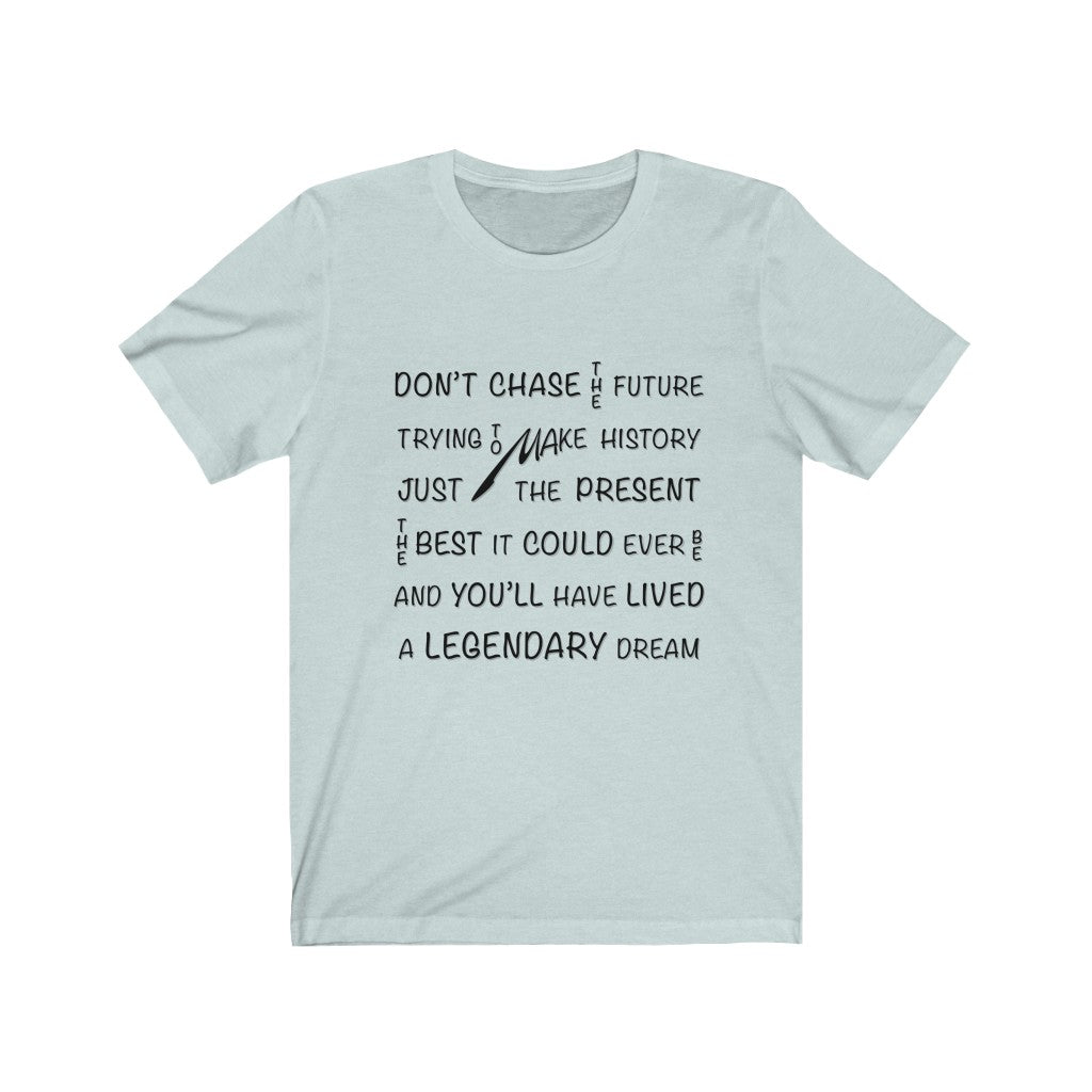 CHASING THE PRESENT - Light blue T-Shirt with black ink typography using vertical and horizontal text. Originating in the mind of Sir Real Words, brought to life by Sir Real Digital.
