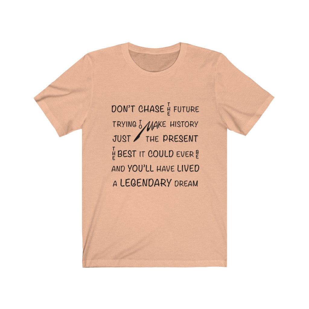 CHASING THE PRESENT - Peach T-Shirt with black ink typography using vertical and horizontal text. Originating in the mind of Sir Real Words, brought to life by Sir Real Digital.