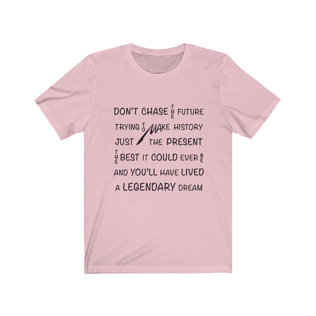 CHASING THE PRESENT - Pink T-Shirt with black ink typography using vertical and horizontal text. Originating in the mind of Sir Real Words, brought to life by Sir Real Digital.