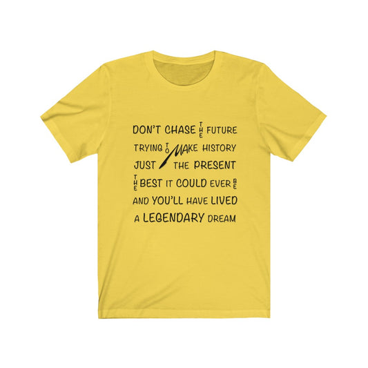CHASING THE PRESENT - Yellow T-Shirt with black ink typography using vertical and horizontal text. Originating in the mind of Sir Real Words, brought to life by Sir Real Digital.